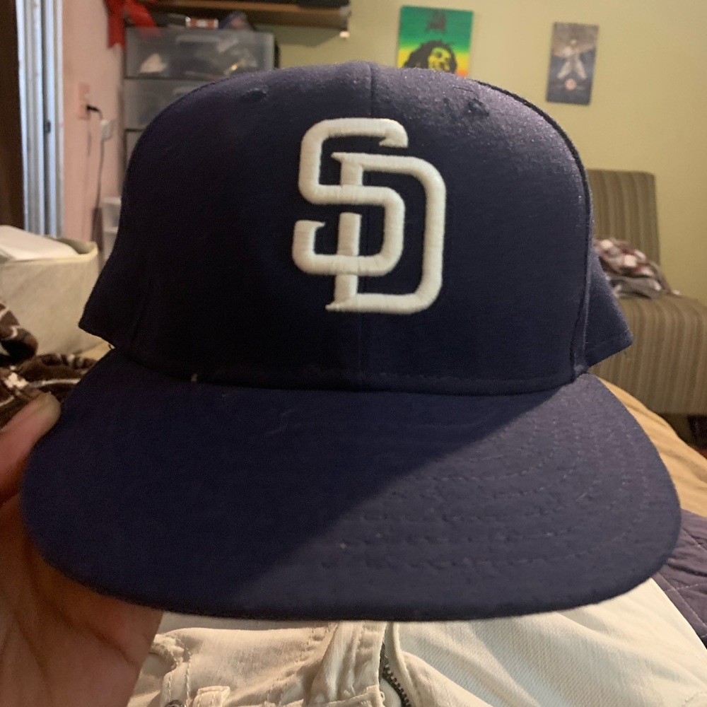 Hats New Era fitted Padres 7 1/4 San Fransisco Giants 7 1/8 La Dodgers 7 $25 ea.